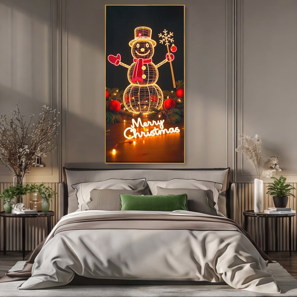 Tablou canvas cu ilustratie cu om de zapada luminos, in rama de aluminiu auriu, pe perete intr-un dormitor